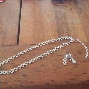 Matching set of earrings with necklace